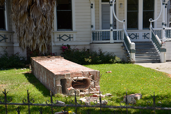 Image: Downed chimney. Secure your chimney with proper mortar, reinforcement bars, and anchor straps.