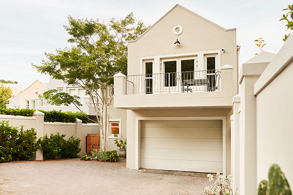 Image: A house with a living space over a garage. Strengthen your soft-story walls.