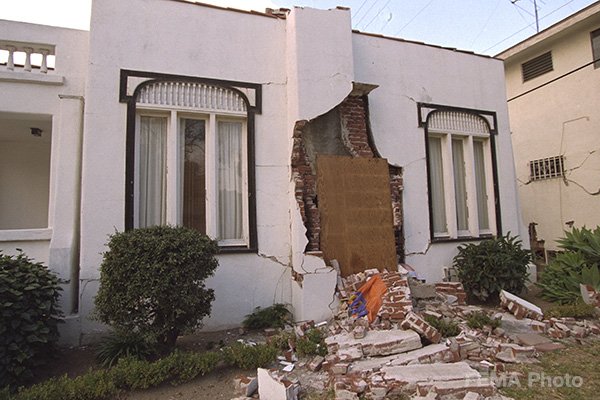 Image: Front of a house with chimney damage following shaking during the 1996 Northridge earthquake.