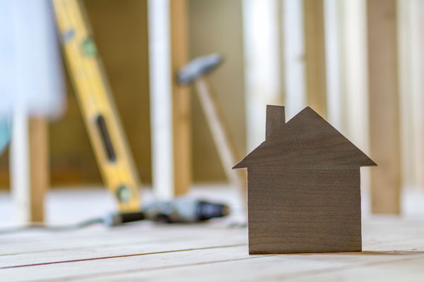 Image: construction with brown house