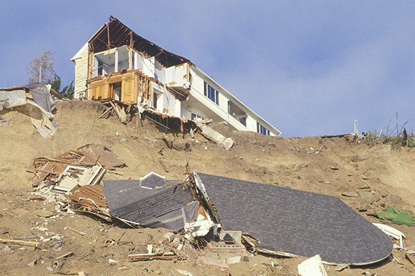 Image: A landslide caused this home in Pacific Palisades to partially fall down a hill following the 1994 Northridge earthquake