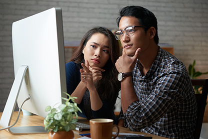 Image: Couple at desktop