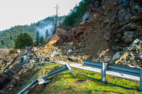 Image: Rockslide spilling on to a winding highway in California