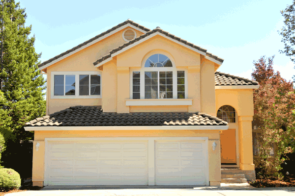 Image: Yellow soft-story home - front
