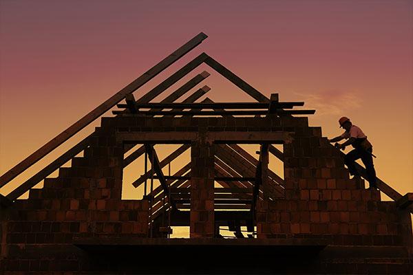 Frame of house in a sun set